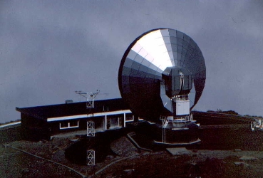 SEST radio dish against coastal fog